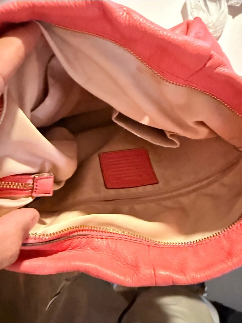 Coach Coral Pink Pebbled Leather Accessory with Gold Coach Emblem